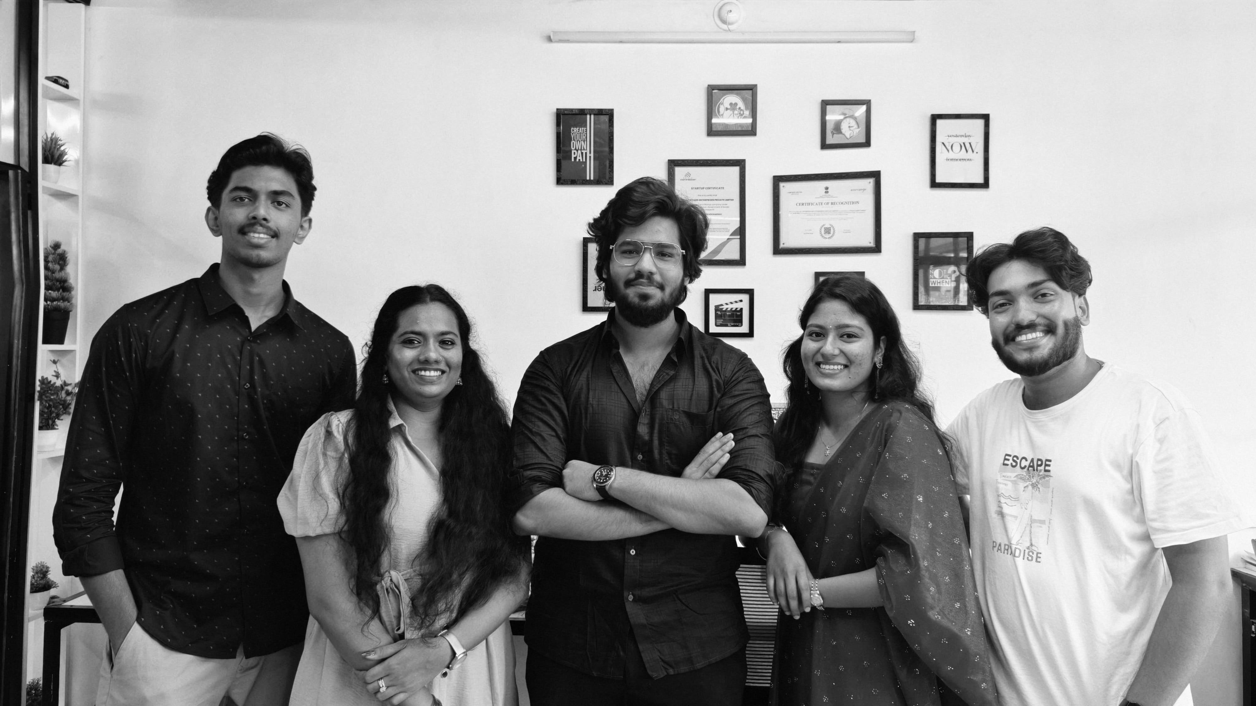 Core team of TechieWizard Enterprises standing together and smiling